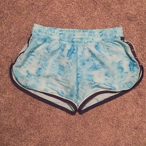 Light blue Under Armour running shorts
